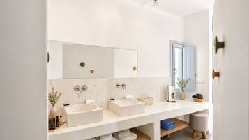 Shower, rainfall showerhead, designer toiletries, hair dryer