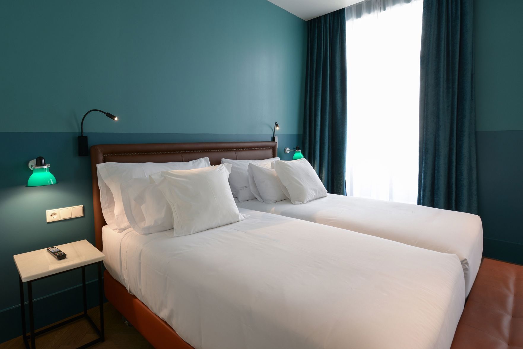 Premium bedding, down comforters, minibar, in-room safe