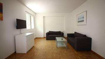Comfort Apartment, Non Smoking, City View | Living area | TV