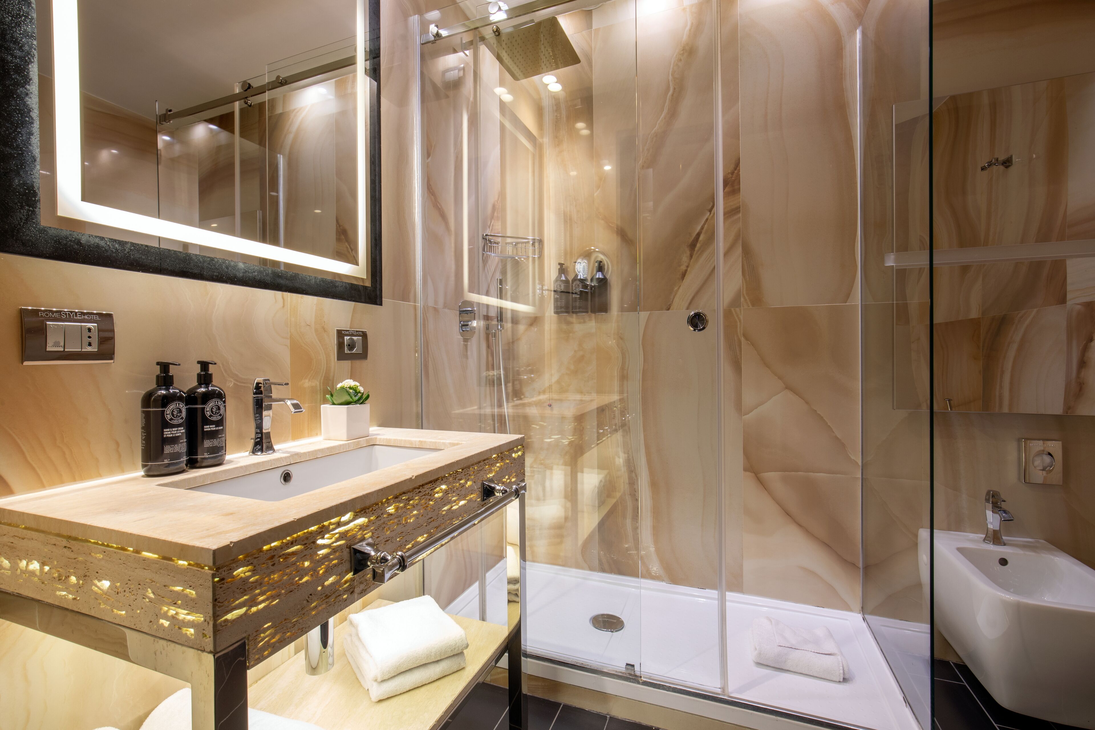 deluxe triple room | bathroom | shower, eco-friendly toiletries, hair dryer, bidet