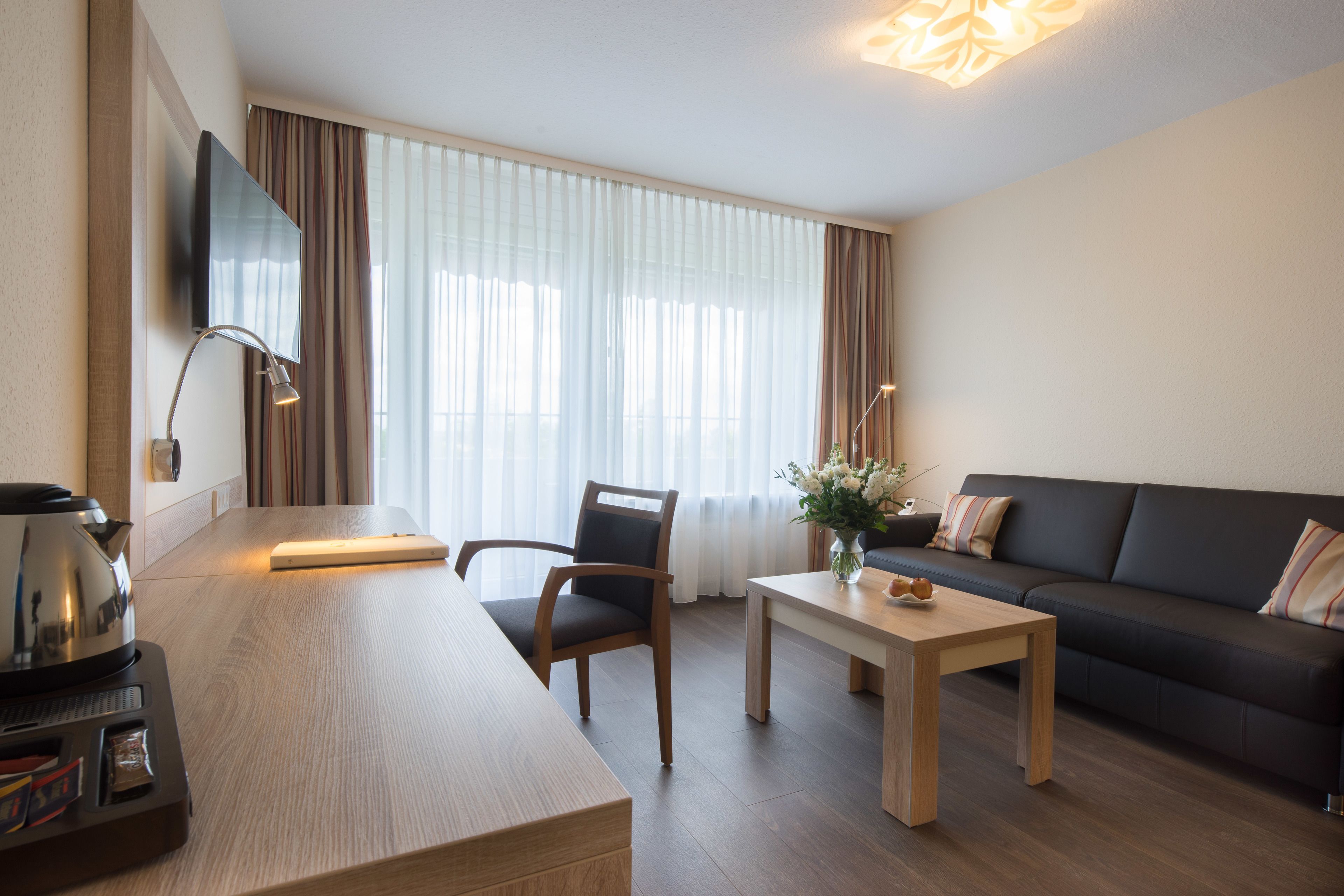 comfort suite, 1 bedroom | living area | 18-inch lcd tv with cable channels, tv