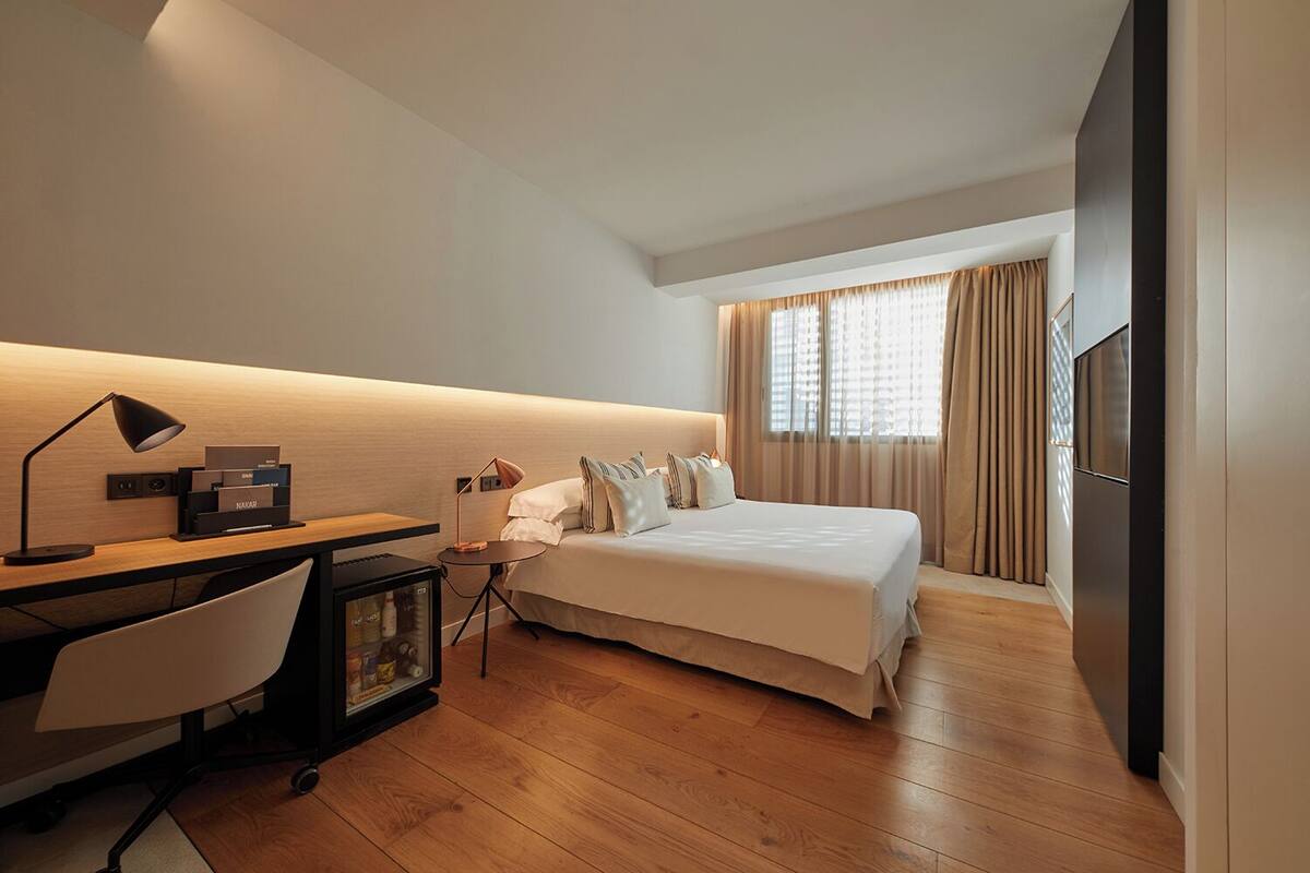 Ropa de cama de alta calidad y minibar 