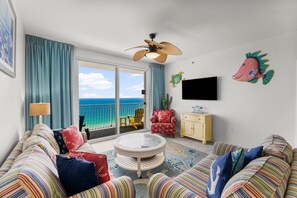 Condo, 2 Bedrooms, Ocean View (1707E) | Living area | 48-inch Smart TV with digital channels, TV, streaming services - Splash Beach Resort by Panhandle Getaways (Panama City Beach)