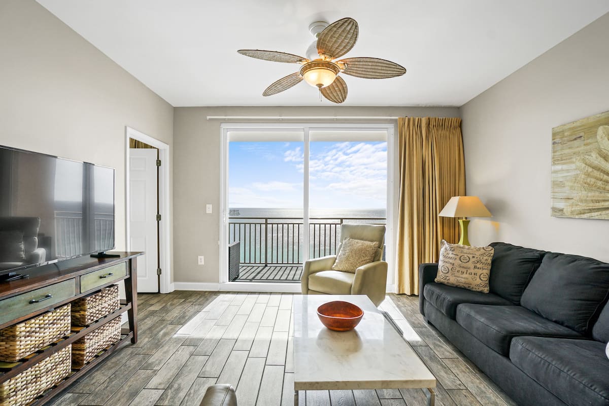 Condo, 2 Bedrooms, Ocean View (1402E) | Living area | 48-inch Smart TV with digital channels, TV, streaming services