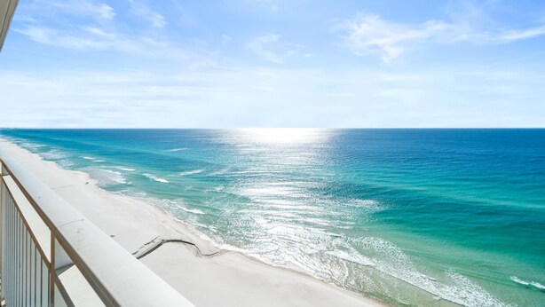 A beach view with clear skies and calm waters. - Splash Beach Resort by Panhandle Getaways (Panama City Beach)