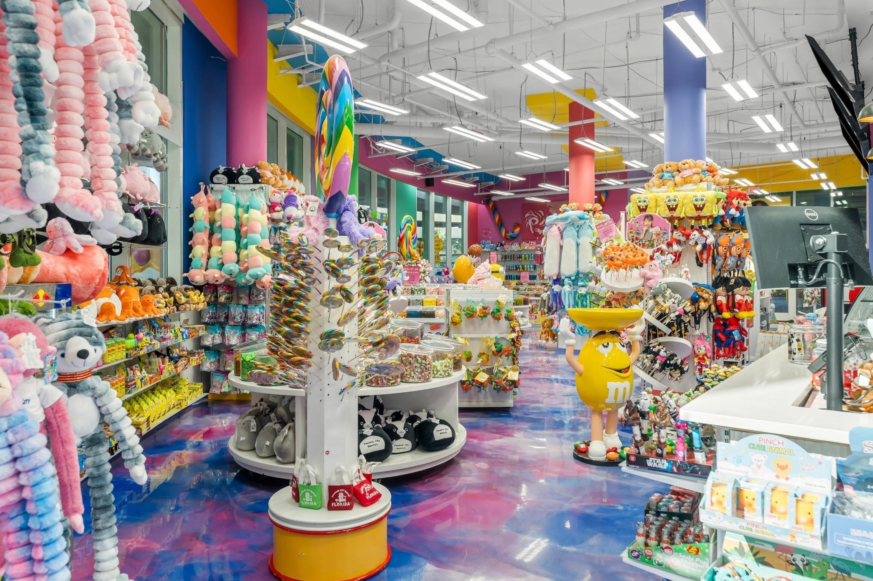 A brightly lit store with colorful displays of plush toys and collectibles.