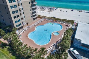 2 outdoor pools, a heated pool, pool umbrellas, pool loungers