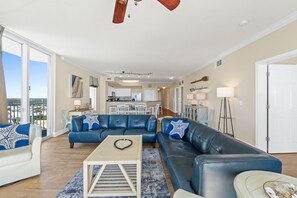 Condo, 4 Bedrooms, Beachfront (2301) | Living area | 50-inch Smart TV with cable channels, TV - Tidewater Beach Resort by Panhandle Getaways (Panama City Beach)