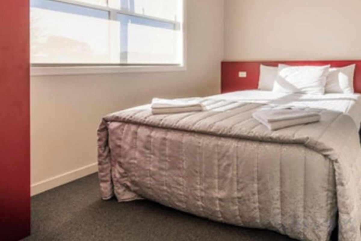 Blackout drapes, soundproofing, iron/ironing board, WiFi (free)