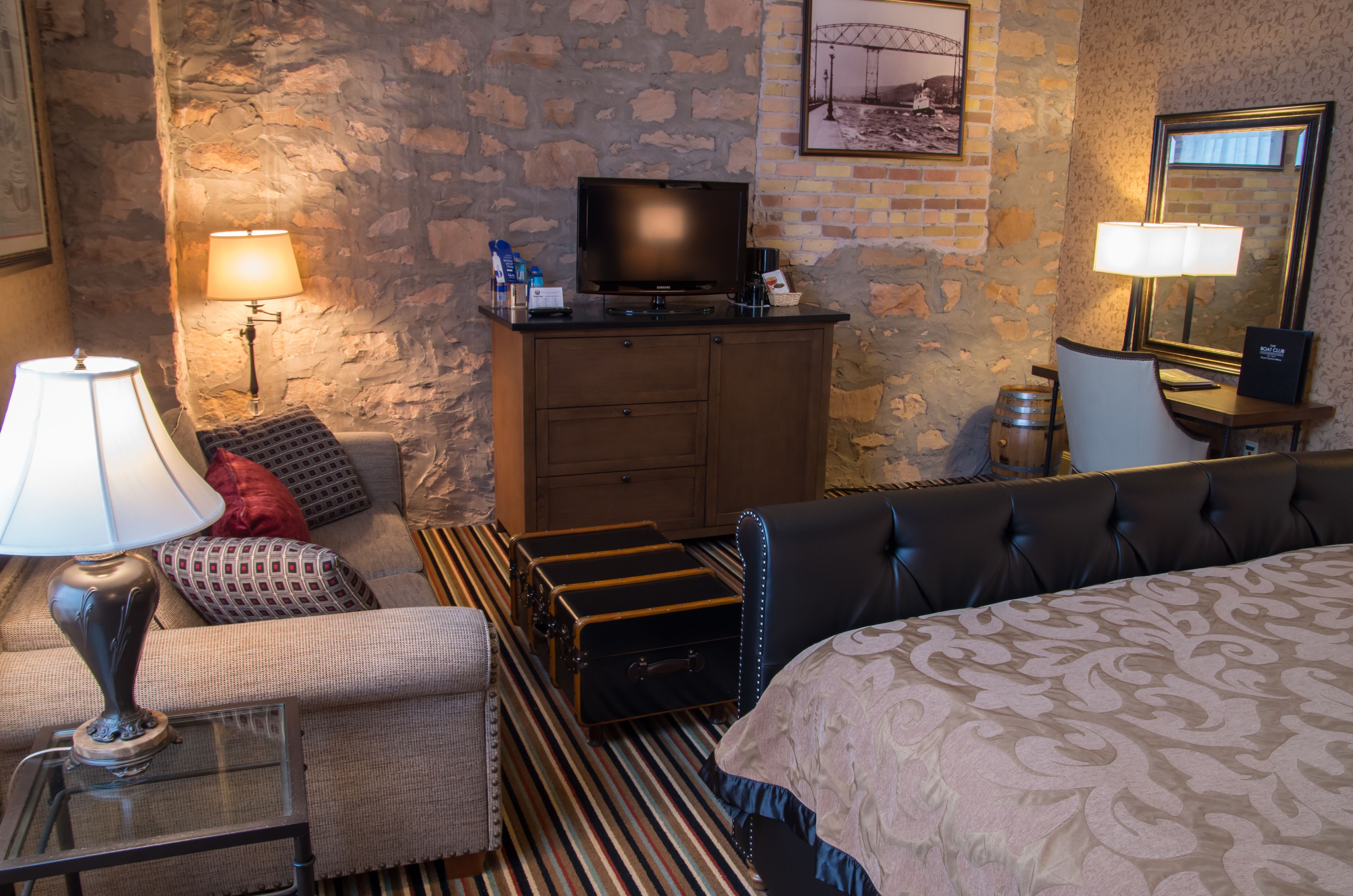 luxury room, 1 king bed with sofa bed, lake view | in-room safe, desk, iron/ironing board, free wifi