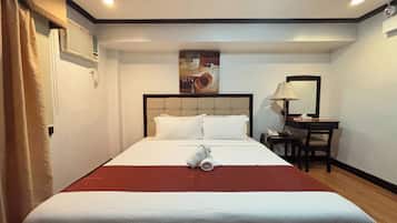 Suite ejecutiva | 1 habitación, escritorio, tabla de planchar con plancha y wifi gratis