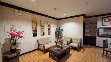 Desk, blackout drapes, iron/ironing board, rollaway beds