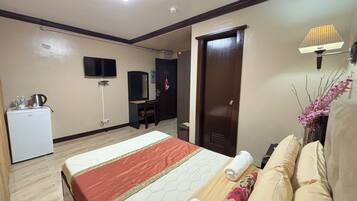 Superior Room | Desk, blackout curtains, iron/ironing board, rollaway beds
