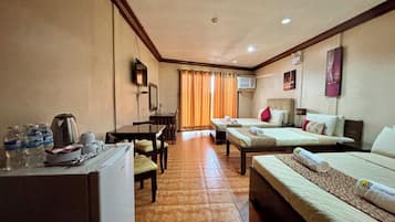 Family Room | Desk, blackout drapes, iron/ironing board, rollaway beds