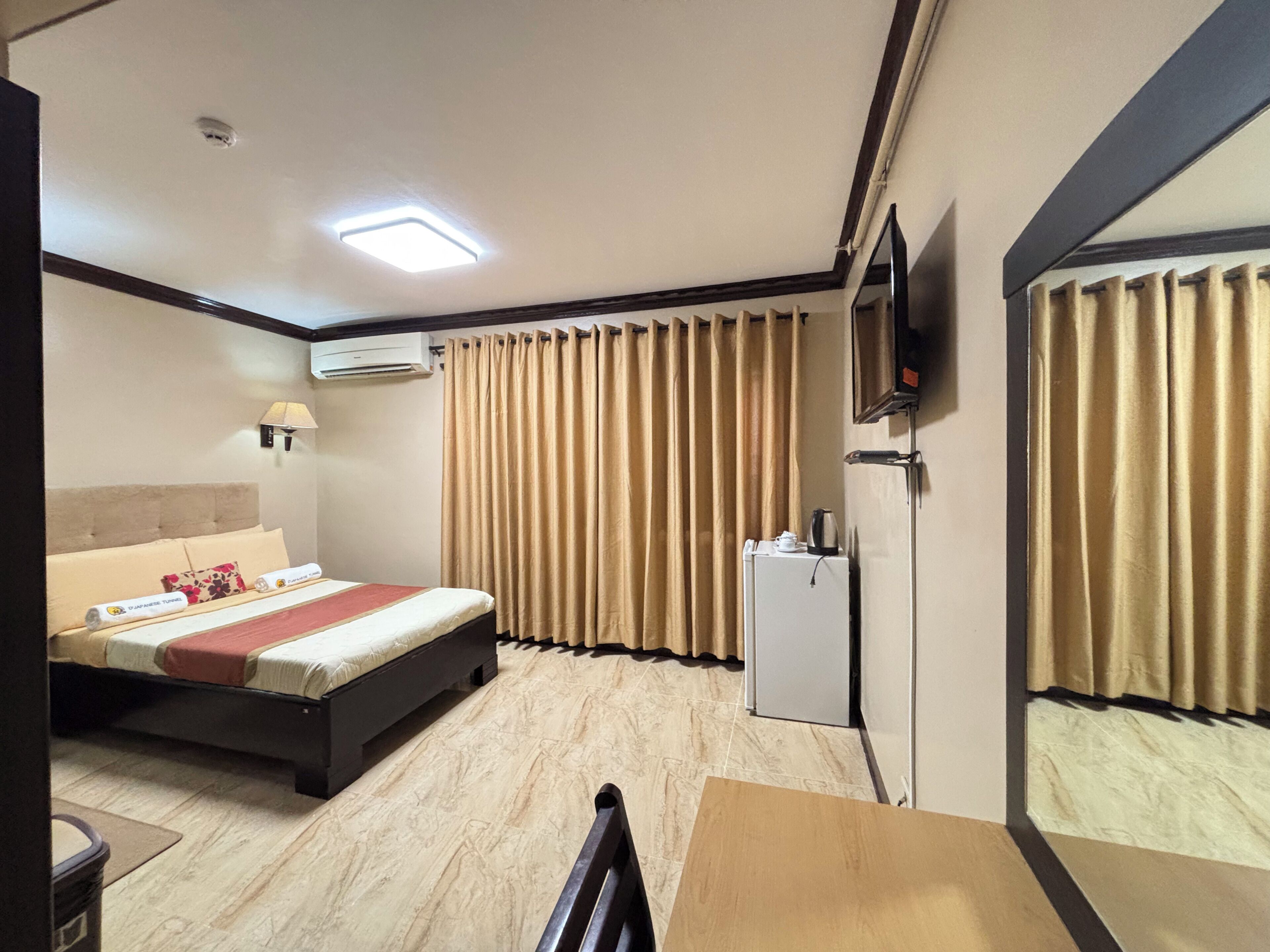Desk, blackout drapes, iron/ironing board, free WiFi