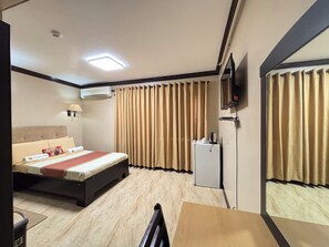 Superior Room | Desk, blackout drapes, iron/ironing board, free WiFi