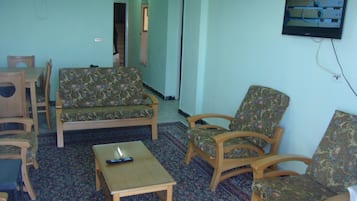 Apartment, 2 Bedrooms | Living area | LCD TV