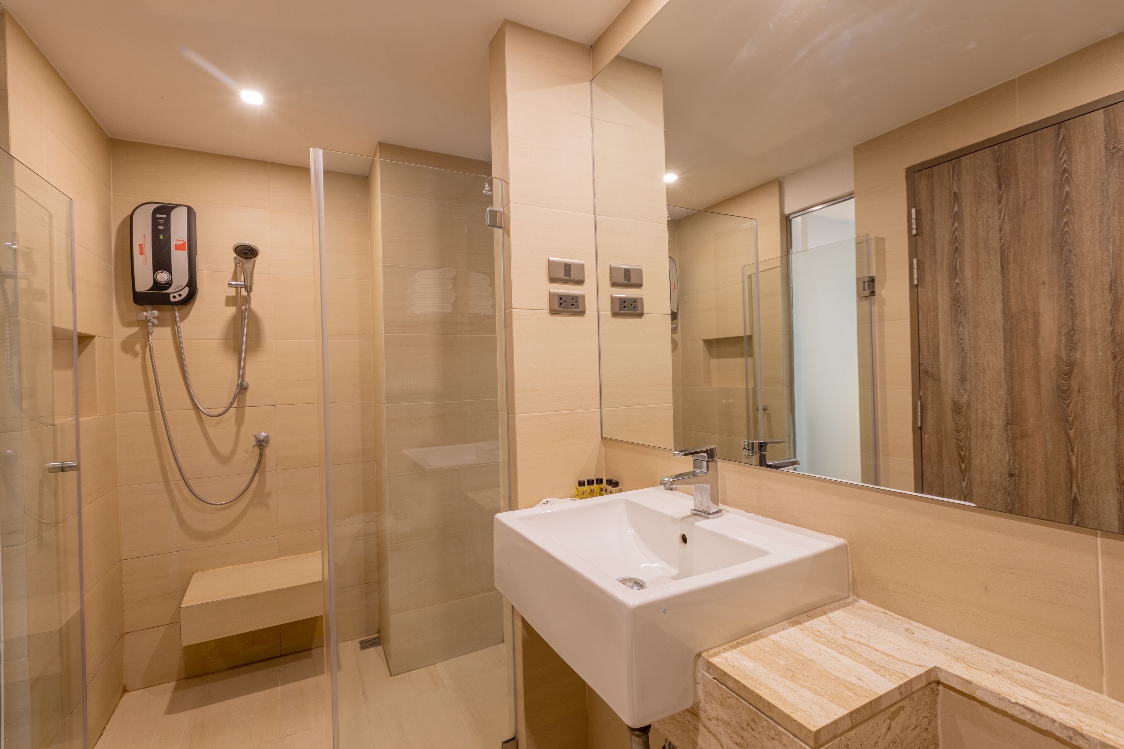 shower, free toiletries, hair dryer, towels