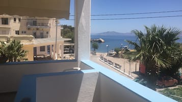 Basic Triple Room, 1 Bedroom, Sea View | Balcony view