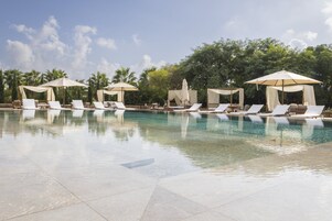 Outdoor pool, pool umbrellas, sun loungers