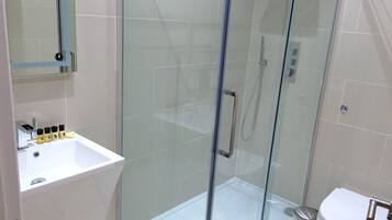 Apartment, 1 Bedroom | Bathroom | Shower, free toiletries, hair dryer, towels
