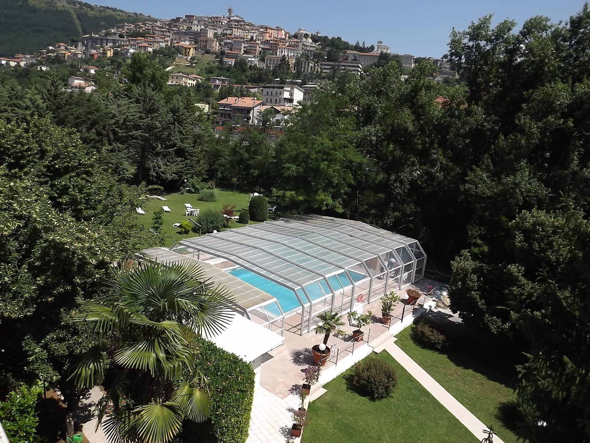 seasonal outdoor pool, a rooftop pool, pool loungers