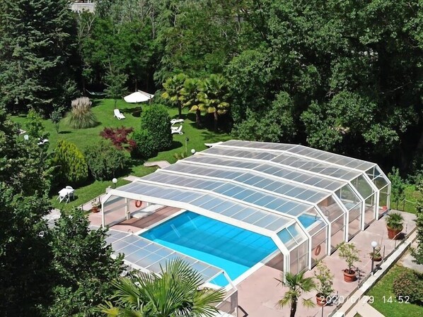 Seasonal outdoor pool, a rooftop pool, sun loungers