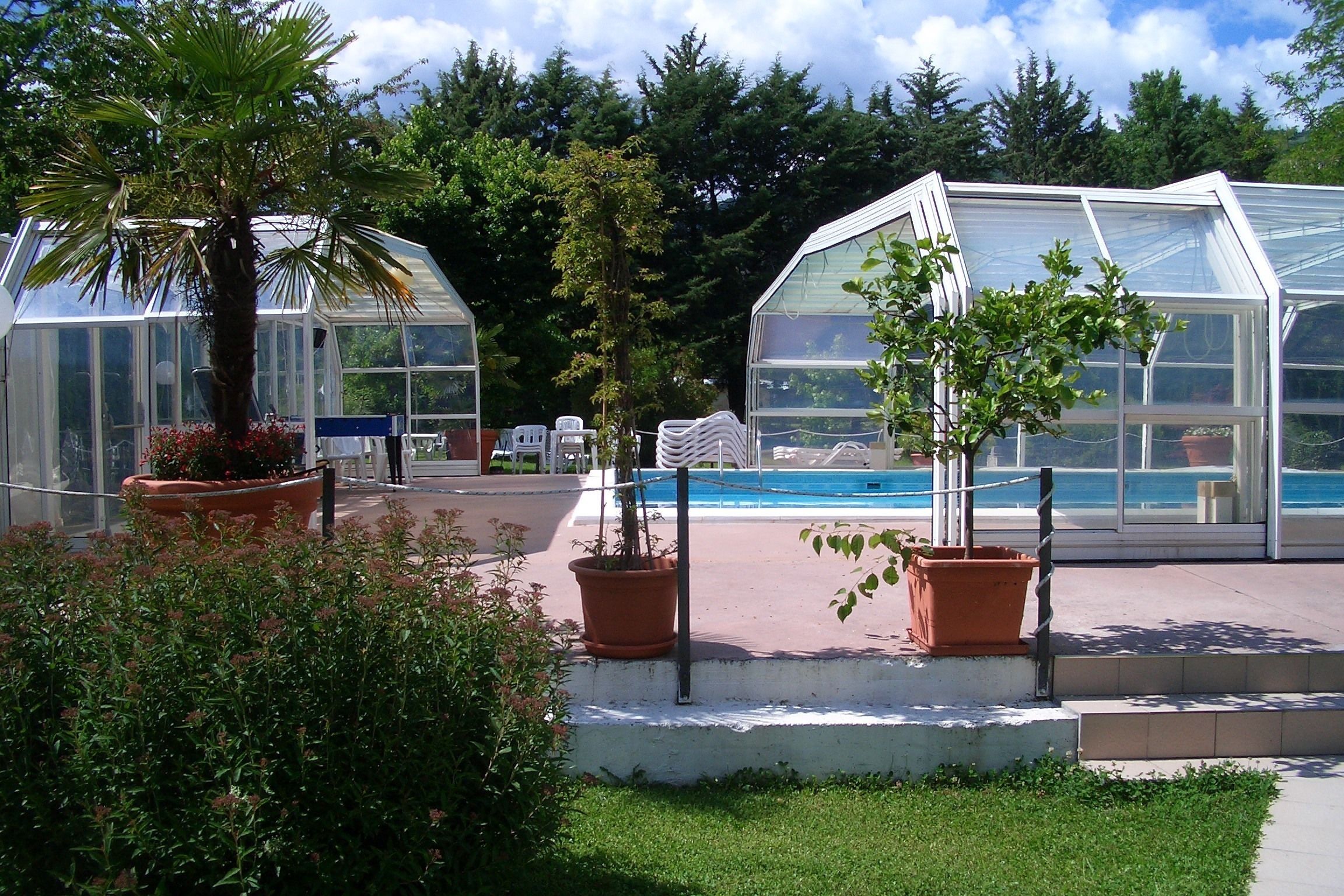 seasonal outdoor pool, a rooftop pool, pool loungers