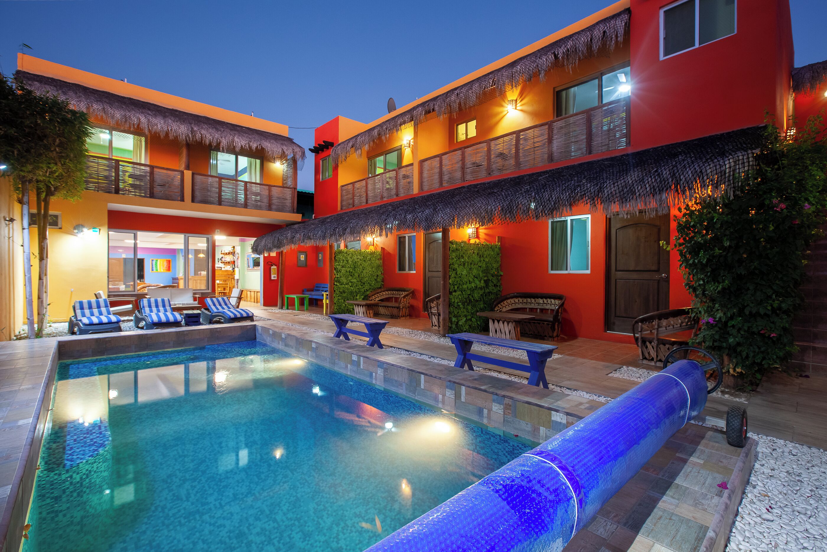 Outdoor pool, a heated pool, open 9:00 AM to 8:00 PM, pool loungers