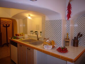 Apartamento, 3 quartos | Cozinha americana privada