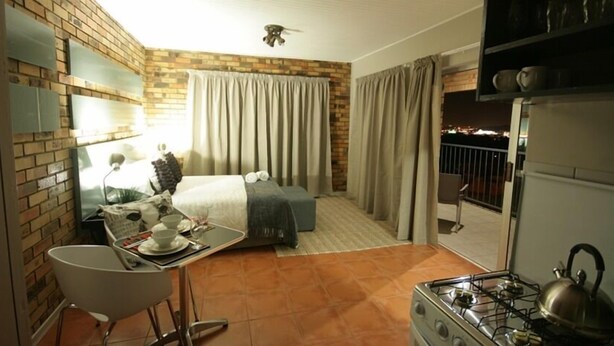 Standard Apartment | Living area - 94onWild (Pretoria)