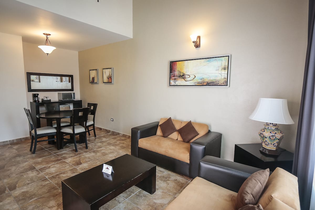 Junior Suite | 1 bedroom, in-room safe, desk, cots/infant beds