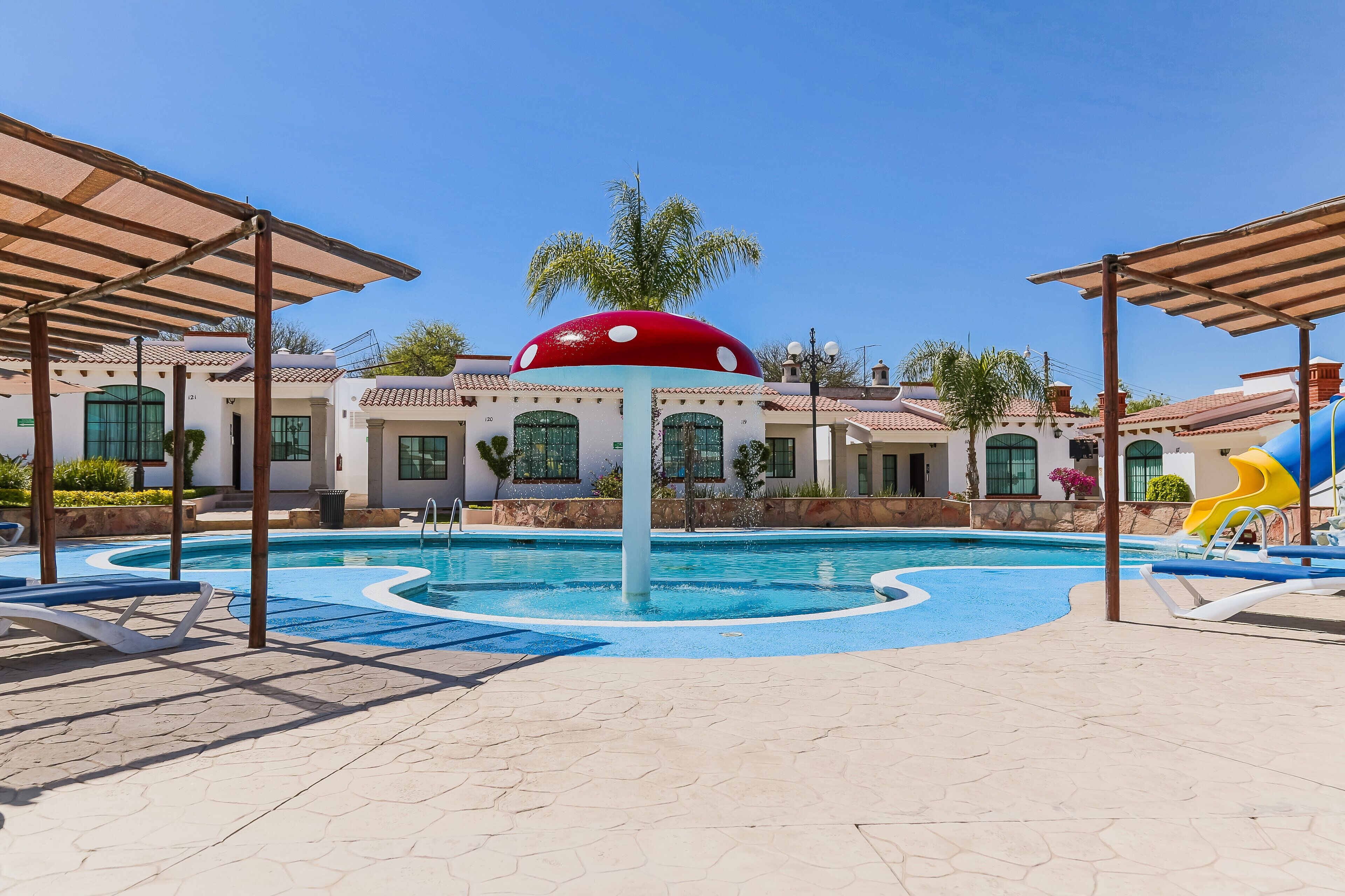 2 outdoor pools, pool umbrellas, pool loungers