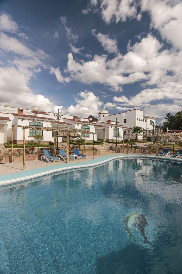 2 outdoor pools, pool umbrellas, pool loungers