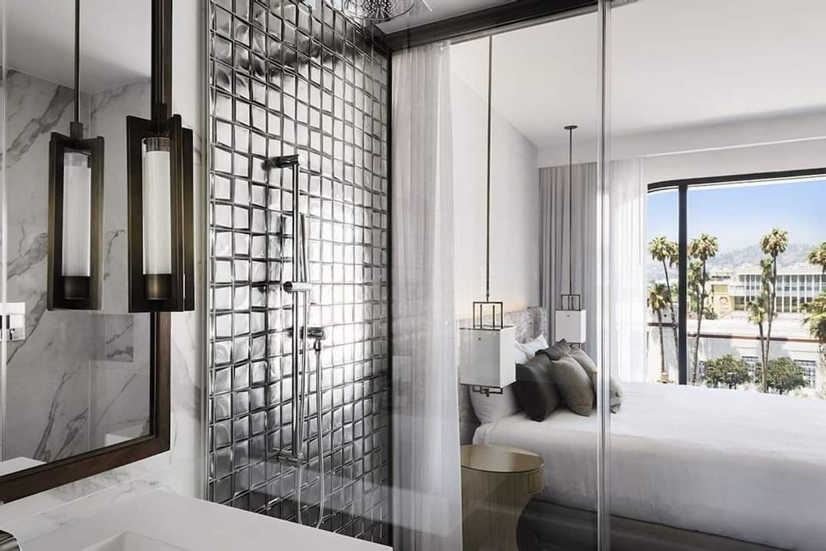 Shower, rainfall showerhead, designer toiletries, hair dryer
