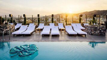 Outdoor pool, open 8:00 AM to 7:00 PM, pool cabanas (surcharge)