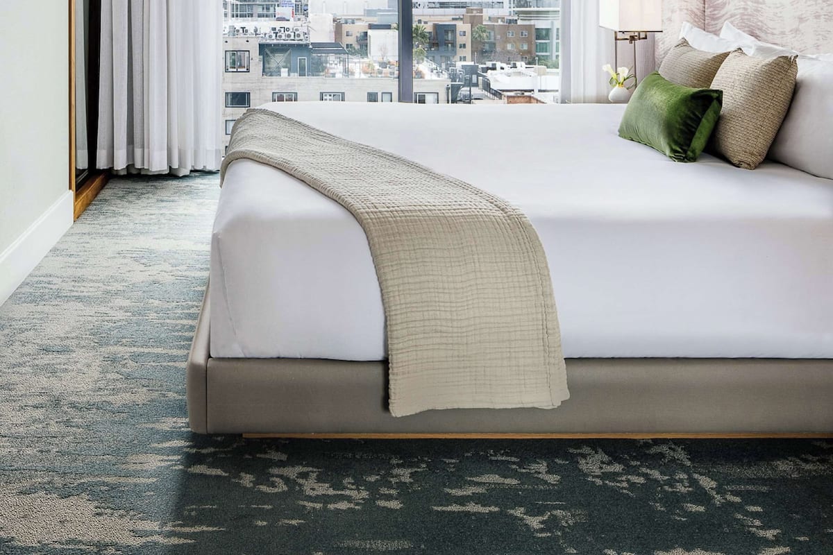 Premium bedding, down duvets, Select Comfort beds, in-room safe