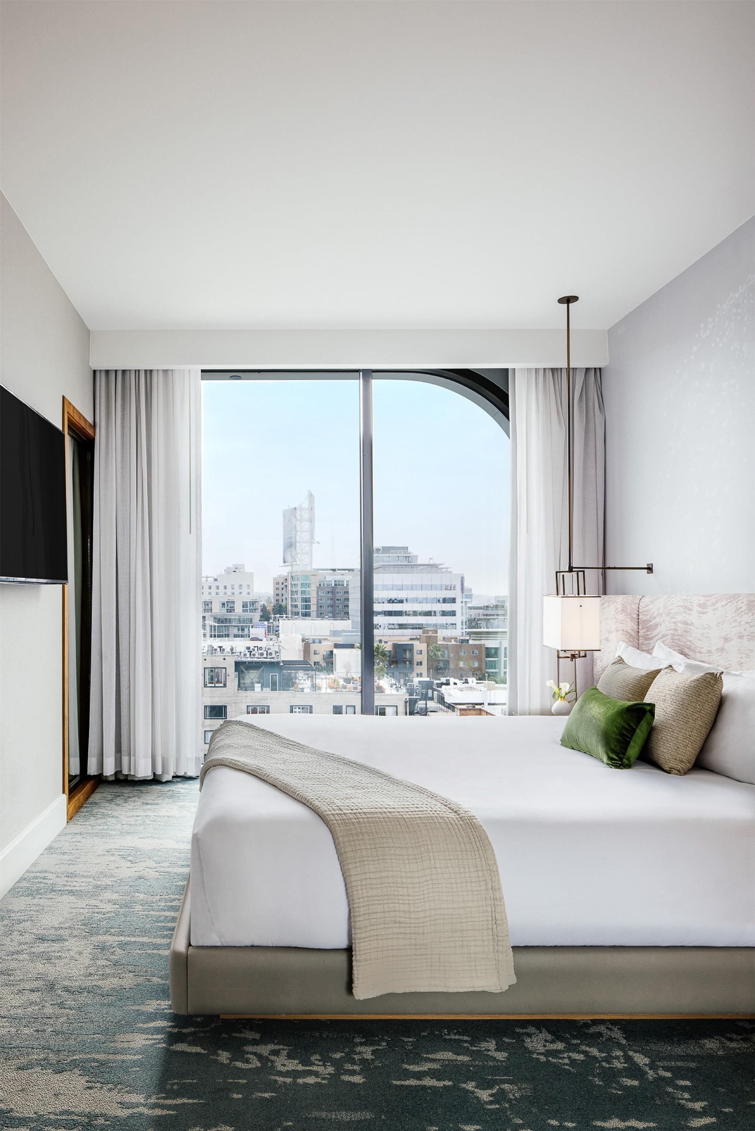 Premium bedding, down duvets, Select Comfort beds, in-room safe