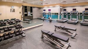 A gym with treadmills, elliptical machines, and dumbbells. - Fairfield Inn & Suites San Antonio Brooks City Base (San Antonio)