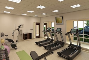 A fitness room with treadmills, a stationary bike, and a rowing machine. - Holiday Inn Express & Suites Blackwell by IHG (Blackwell)