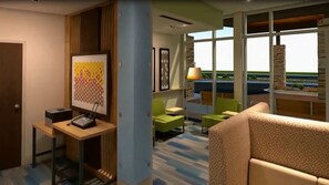 A hotel room with a desk, a telephone, a chair, a sofa, and a large window with a view. - Holiday Inn Express & Suites Blackwell by IHG (Blackwell)