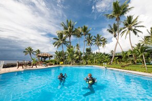 Outdoor pool, pool umbrellas, pool loungers