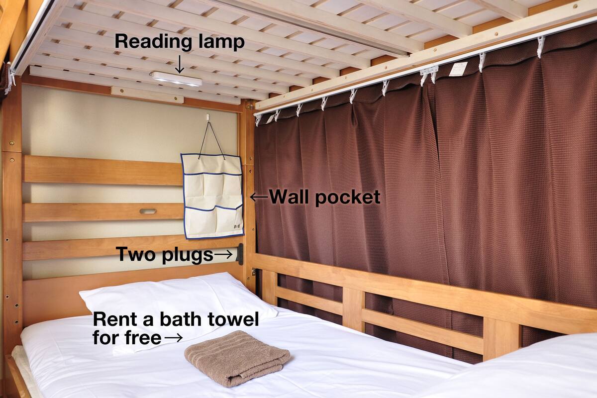 14 beds mixed dorm with shared bathroom | In-room safe, free WiFi, bed sheets