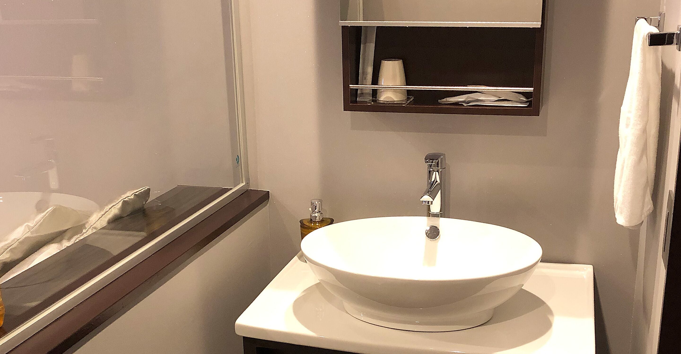 single room (no bathroom in the room. please use large public bath on 8th floor) | bathroom | combined shower/bathtub, hydromassage showerhead, free toiletries