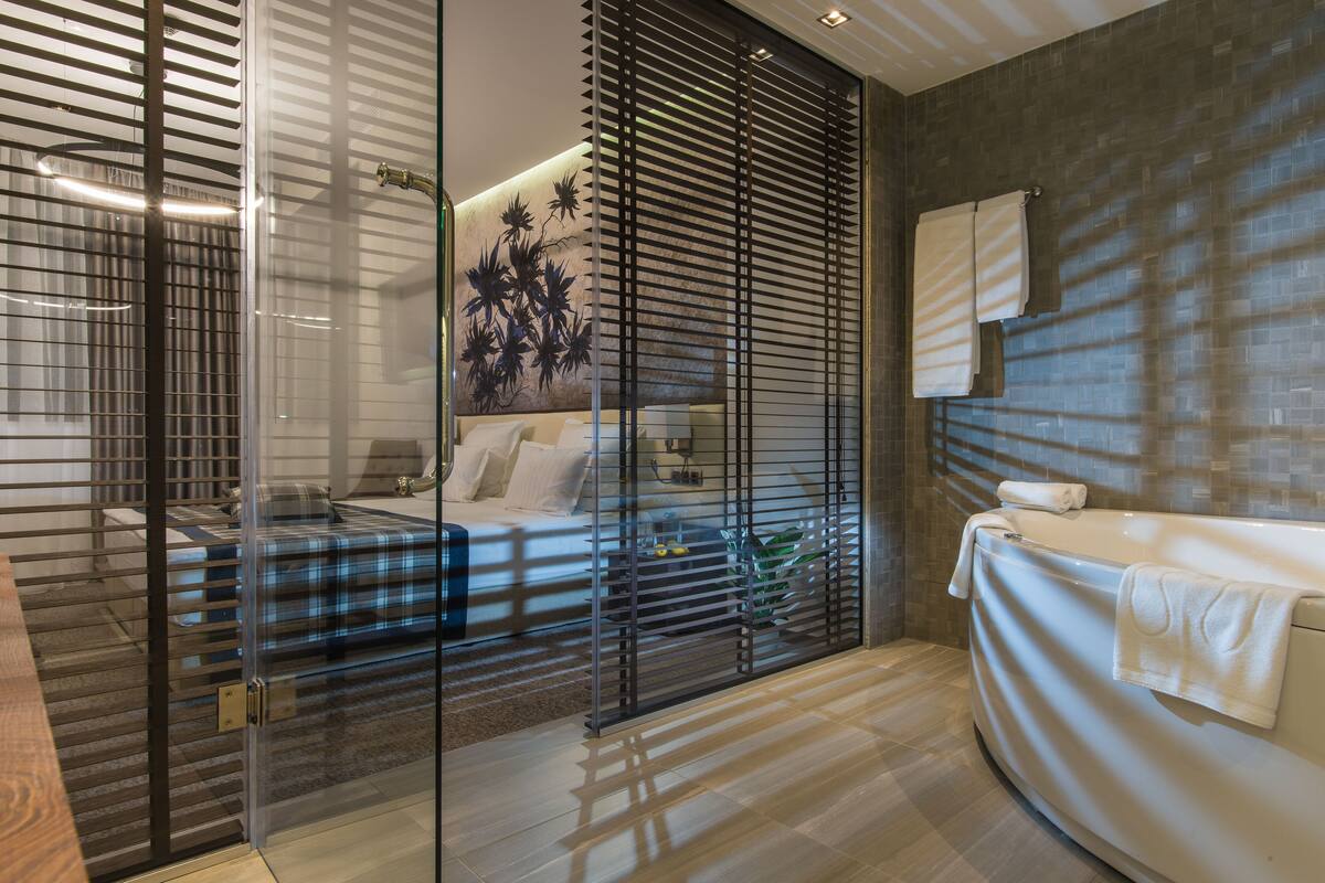 one bedroom apartment | bathroom | free toiletries, hair dryer, bathrobes, slippers