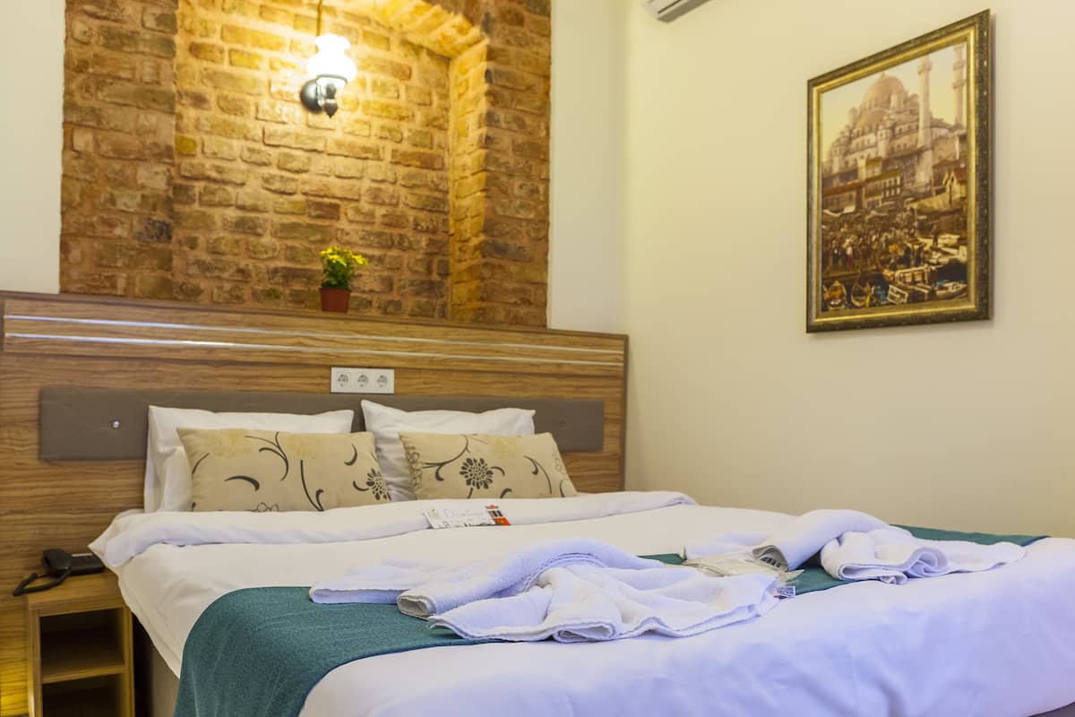 Economy Double Room | Down comforters, in-room safe, soundproofing