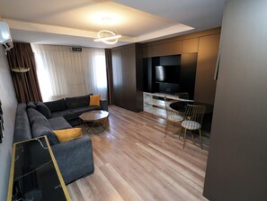 Deluxe Suite, 2 Bedrooms, Jetted Tub | Living area | 55-inch LCD TV with satellite channels, TV - No 139 Apartments (Istanbul)