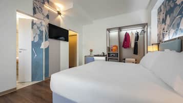 Caja de seguridad en la habitación, cortinas blackout y ropa de cama