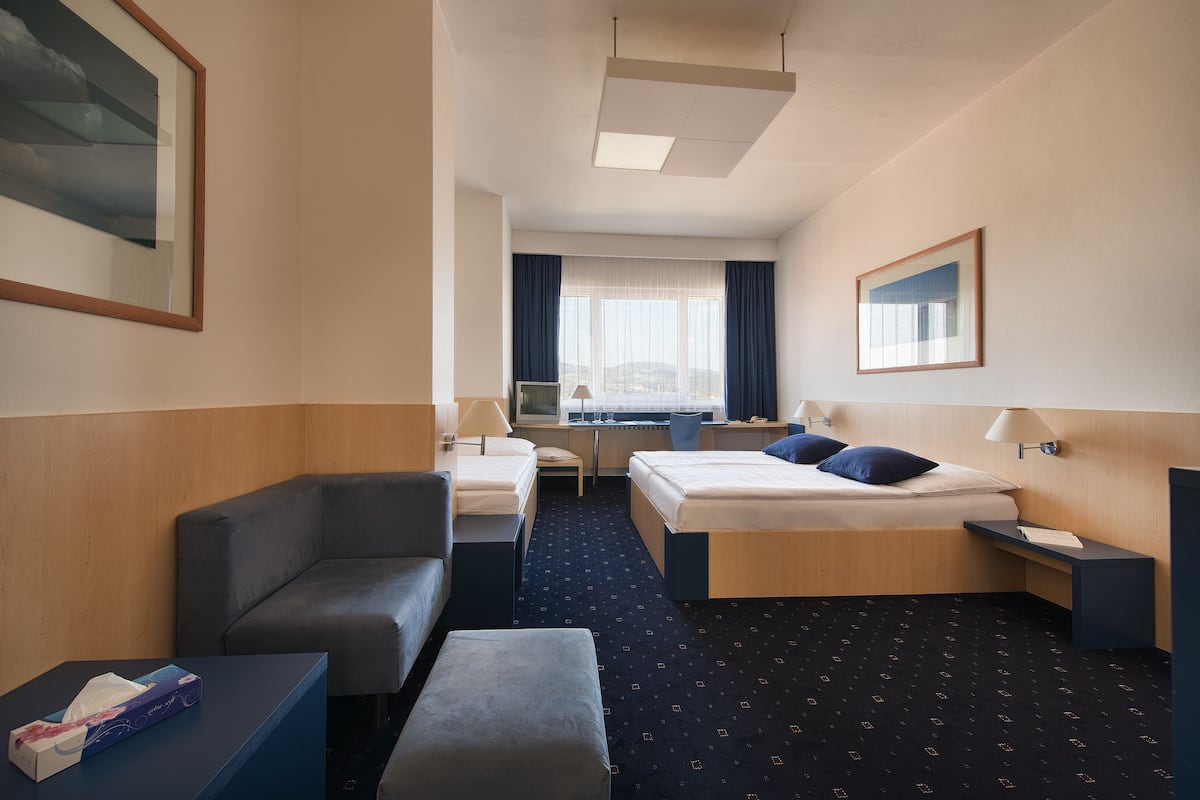 comfort triple room, city view | 1 bedroom, minibar, in-room safe, desk