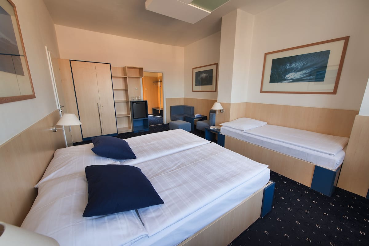 comfort triple room, city view | 1 bedroom, minibar, in-room safe, desk